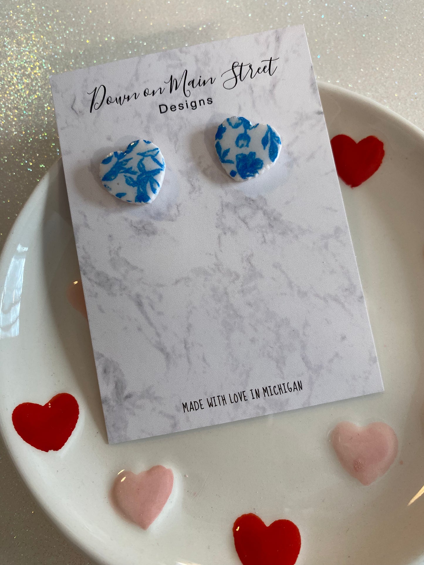 Blue floral heart studs