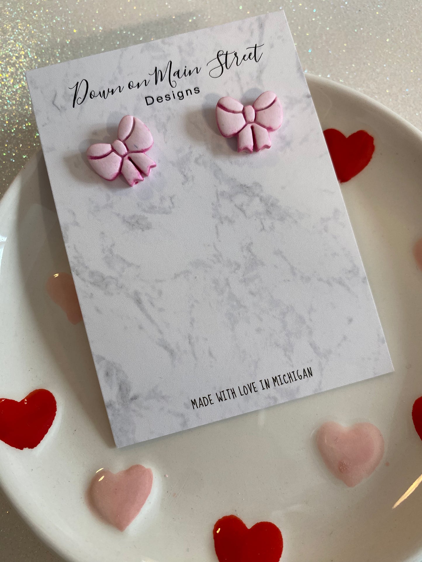 Pink bow studs