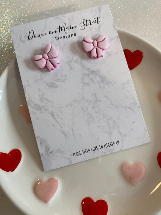 Pink bow studs