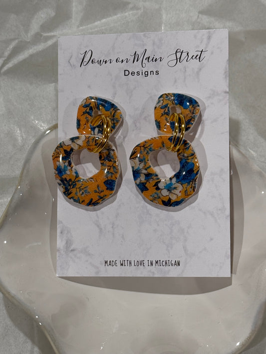 Orange floral dangles